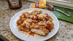 残ったチキンカツがごちそうに：ケチャップ×チーズでオーブン焼き（材料3つ・10分）